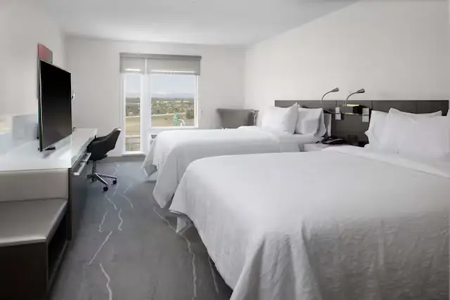 Hilton Garden Inn Denver Thornton guest room with two beds